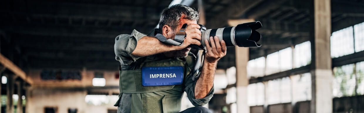 Fotógrafo em reportagem